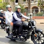 Maharashtra cm Devendra Fadnavis rides bike for fuel conservation