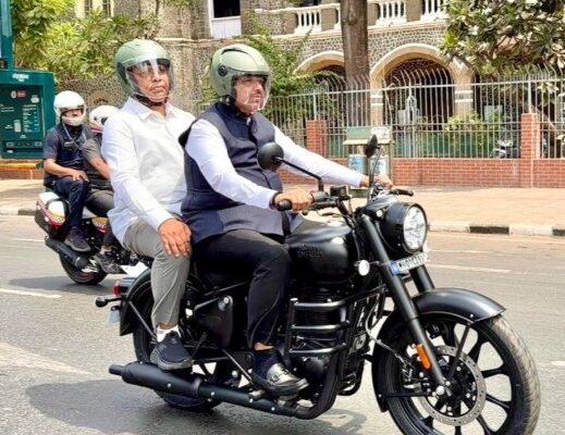 Maharashtra cm Devendra Fadnavis rides bike for fuel conservation