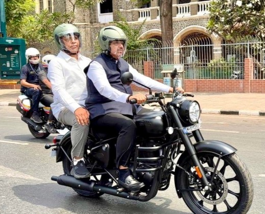 Maharashtra cm Devendra Fadnavis rides bike for fuel conservation