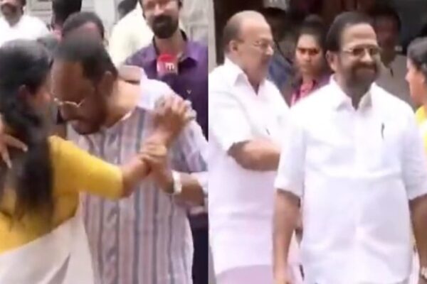 kerala congress leader tried to hug new lady MLA forcefully