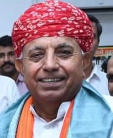 Minister Bhagirath Choudhary takes subsidy for his cucumber crop