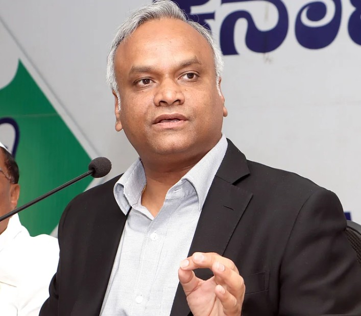 KPSC Scam Priyank Kharge Challenges Opposition Promises Political Retirement If Allegations Proven