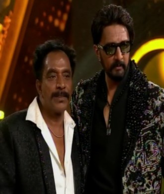 Second Innings in Test Cricket Kiccha Sudeep Pulls Om Prakash Rao s Leg on Bigg Boss Stage