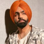 Gunfire Hits Ammy Virk Convoy in Abbotsford Bulletproof Vehicle Saves the Singer from Major Disaster